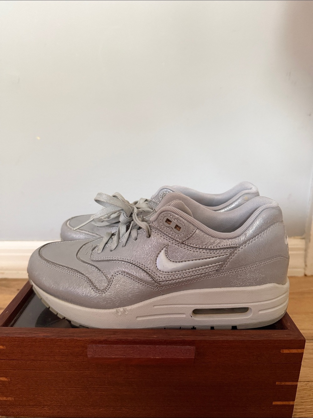 Nike Women’s Air Max 1 Sneakers in Metallic Silver